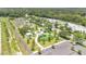 Aerial view of community park featuring a skate park, playground, and scenic green spaces at 900 Northern Dancer Way # 204, Casselberry, FL 32707