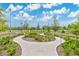 Beautiful community garden featuring walking paths, colorful plants, and serene landscaping at 900 Northern Dancer Way # 204, Casselberry, FL 32707