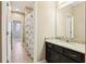 Stylish bathroom featuring granite countertops and a modern vanity at 9207 Busaco Park Way, Winter Garden, FL 34787