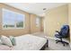Bright bedroom with a large window and a comfortable bed, perfect for relaxation at 9207 Busaco Park Way, Winter Garden, FL 34787