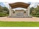 Inviting community entrance sign for Watermark, surrounded by lush landscaping at 9207 Busaco Park Way, Winter Garden, FL 34787