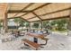Community picnic area with multiple tables, grills, and ample seating at 9207 Busaco Park Way, Winter Garden, FL 34787