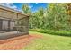 Backyard with patio and a view of the treeline at 976 Rock Harbor Ave, Orlando, FL 32828