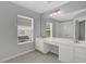 Spacious bathroom with double sinks, vanity and large mirror at 976 Rock Harbor Ave, Orlando, FL 32828