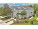Beautifully landscaped home features a gray exterior, attached garage, and a manicured front yard at 976 Rock Harbor Ave, Orlando, FL 32828