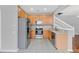 Charming kitchen featuring stainless steel appliances and ample cabinet space at 976 Rock Harbor Ave, Orlando, FL 32828