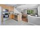 Modern kitchen with stainless steel appliances and views of the dining and living areas at 976 Rock Harbor Ave, Orlando, FL 32828