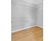 Bright walk-in closet featuring wire shelving and laminate flooring at 976 Rock Harbor Ave, Orlando, FL 32828