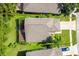 Aerial view of the home showcasing the backyard, landscaping, and surrounding neighborhood at 9966 Hidden Dunes Ln, Orlando, FL 32832