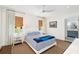 Cozy bedroom with a full bed, stylish curtains, and ceiling fan at 1011 Lake Davis Dr, Orlando, FL 32806