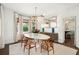 Spacious dining room with modern lighting, elegant decor, and access to other living spaces at 1011 Lake Davis Dr, Orlando, FL 32806