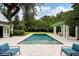 Refreshing pool area with lush landscaping and outdoor dining at 1011 Lake Davis Dr, Orlando, FL 32806