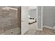 Modern bathroom featuring a glass shower and neutral color scheme at 1061 Castlevecchio Loop, Orlando, FL 32825