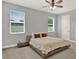 Serene main bedroom with neutral color scheme and natural light at 1061 Castlevecchio Loop, Orlando, FL 32825