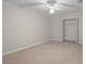 Bright bedroom showcasing carpet and a closet with open doors at 110 Rabun Ct, Sanford, FL 32773