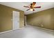 Bedroom with neutral walls and view of entryway and closet at 119 Glendale Dr, Longwood, FL 32750