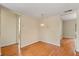 Dining area with hardwood floors located between two entryways for easy access at 119 Glendale Dr, Longwood, FL 32750