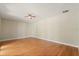 Spacious living room featuring wood floors and ceiling fan at 119 Glendale Dr, Longwood, FL 32750