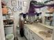 Well-organized bathroom with ample storage, a vanity with sink, and decorative accents at 1409 Oak Pl # F, Apopka, FL 32712