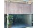 Bottom view of a garage/balcony with plants around it at 1409 Oak Pl # F, Apopka, FL 32712