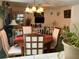 Dining Area blending seamlessly with the living room for an open and airy feel at 1409 Oak Pl # F, Apopka, FL 32712
