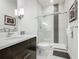 Modern bathroom featuring a single vanity and glass enclosed shower at 1521 Tranquil Ave, Clermont, FL 34714