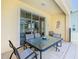 Relax on the patio with a dining set, perfect for outdoor entertaining at 1521 Tranquil Ave, Clermont, FL 34714