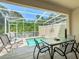 Private screened-in pool and patio area, ideal for outdoor enjoyment at 1521 Tranquil Ave, Clermont, FL 34714