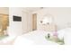Bright bedroom with an attached bathroom and walk-in closet at 1545 Fairview Cir, Reunion, FL 34747