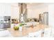 Well-equipped kitchen with stainless steel appliances, a large island, and ample counter space at 1545 Fairview Cir, Reunion, FL 34747
