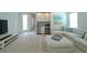 Relaxing living room with a large comfy couch and lots of natural light at 1545 Fairview Cir, Reunion, FL 34747