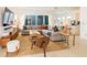 Comfortable living room with a large sectional sofa, natural light, and stylish decor at 1545 Fairview Cir, Reunion, FL 34747