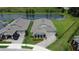 Aerial view of elegant home with manicured lawn at 1774 Pasture Loop, Oviedo, FL 32765