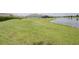 Expansive backyard featuring a serene lake view perfect for outdoor enjoyment at 1774 Pasture Loop, Oviedo, FL 32765