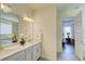 Bright bathroom with double sinks leads to the Primary bedroom at 1774 Pasture Loop, Oviedo, FL 32765