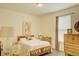 Spare bedroom features a bed, vintage decor, and natural light from window at 1774 Pasture Loop, Oviedo, FL 32765