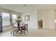 The dining room is bright and airy with a view to the backyard at 1774 Pasture Loop, Oviedo, FL 32765