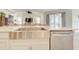 The kitchen island includes a large stainless steel farmhouse sink and dishwasher at 1774 Pasture Loop, Oviedo, FL 32765