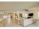 Open-concept living room showcasing neutral colors, modern furnishings, and ample natural light at 1774 Pasture Loop, Oviedo, FL 32765