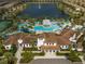 Aerial view of community building featuring a lake, pool, lazy river, basketball court, playground and lounge seating at 1909 Majorca Dr, Kissimmee, FL 34747