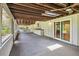 Spacious screened-in back porch offers plenty of room for outdoor living and entertaining at 207 S Sweetwater Blvd, Longwood, FL 32779