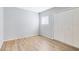 Bright bedroom with laminate flooring, closet and neutral paint provides a blank canvas to create your dream space at 208 Scottsdale Sq # 208, Winter Park, FL 32792