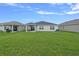 Large backyard perfect for outdoor activities and relaxation at 232 Summerlin Loop, Haines City, FL 33844