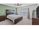 Cozy bedroom with wood accents, plush bedding, and ample natural light at 232 Summerlin Loop, Haines City, FL 33844