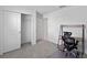 Bright bedroom featuring carpet, a closet, and a versatile desk setup at 232 Summerlin Loop, Haines City, FL 33844