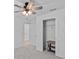 Cozy bedroom with neutral carpet, closet doors, and a ceiling fan at 232 Summerlin Loop, Haines City, FL 33844