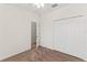 Neutral carpeted bedroom with double door closet offering ample storage at 232 Windflower Way, Oviedo, FL 32765
