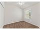This bedroom features neutral carpet and a white ceiling fan for added comfort at 232 Windflower Way, Oviedo, FL 32765