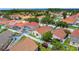 Residential neighborhood, focusing on a home with a fenced-in yard and tiled roof at 2422 Condado Ct, Kissimmee, FL 34743