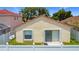 Home exterior showing a window, sliding glass door, and fenced-in yard at 2422 Condado Ct, Kissimmee, FL 34743